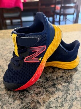 New Balance Navy Kids Sneakers with Yellow and Pink Accents